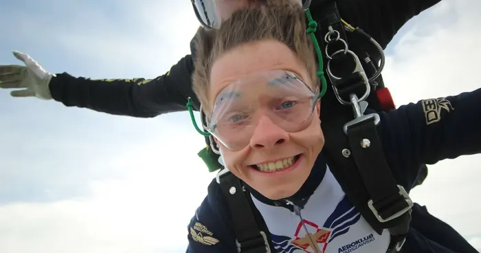 Skydivers in freefall with arms out
